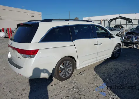 2014 Honda Odyssey Touring/Touring Elite z USA, uszkodzony, nr VIN 5FNRL5H98EB075343